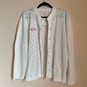 Vintage white cardigan with Cadillac patch